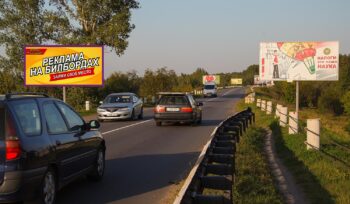 Билборд по ул.Луначарского №5, новостройки Романовичи, Красный Маяк